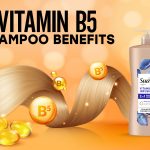 Bottle of Vitamin B5 shampoo with natural ingredients like aloe vera and panthenol placed on a bathroom counter, highlighting benefits for healthy hair.